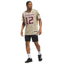 adidas Texas A&M camo football jersey featuring maroon number 12 graphics, Aggies back nameplate, SEC logo, Texas flag sleeve patch, and tan camouflage print for the October 3rd Arkansas game.
