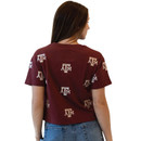 Gameday Social maroon Texas A&M cropped tee featuring short sleeves, a relaxed cropped silhouette, and an allover repeating A&M logo print across the front, back, and sleeves.