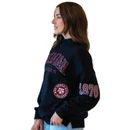 Gameday Social black Texas A&M crewneck featuring distressed maroon Texas A&M lettering, College Station TX text, 1876 sleeve graphic, Aggies script, stars, and assorted collegiate-inspired graphics throughout.