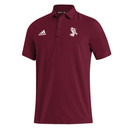 Maroon adidas Texas A&M polo shirt featuring the white Ol’ Sarge basketball logo on the left chest and the adidas logo on the right chest, short sleeve collared Texas A&M Aggies performance polo designed for gameday, golf, or business casual wear.