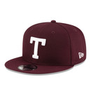 New Era Texas A&M maroon flat bill snapback hat with white T logo on front, Aggies structured high crown baseball cap.