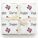 Aspen & Arlo Texas A&M Aggies graduation wrapping paper with Graduate 2026 script and Texas A&M logos on white background, 30 inch roll.