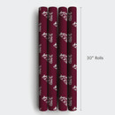 Aspen & Arlo Texas A&M Aggies wrapping paper with repeating Reveille mascot pattern on maroon background, 30 inch rolls.
