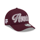 Maroon New Era youth Texas A&M cap featuring oversized white and gray embroidered Aggies script, an embroidered A&M side logo, curved bill, New Era branding, and adjustable snapback closure.