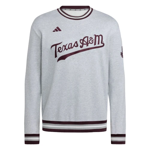 Adidas Texas A&M Aggies gray long sleeve shirt with script Texas A&M graphic and striped cuffs.