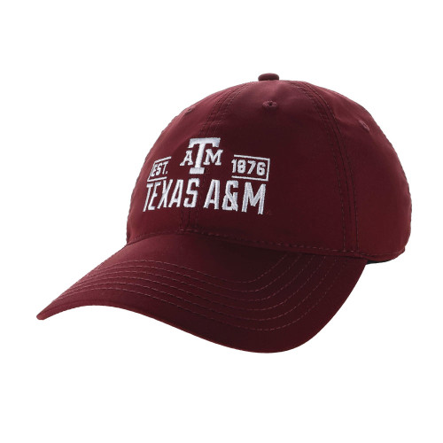 Legacy Texas A&M Aggies maroon cap with embroidered ATM logo, Texas A&M lettering, and Est. 1876 graphic on the front.
