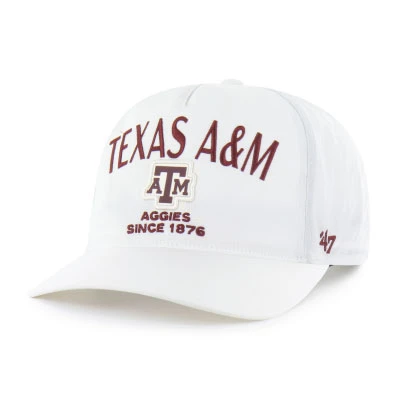 White ’47 Brand cap featuring embroidered Texas A&M lettering, the A&M logo, "Aggies Since 1876" text, a curved bill, and an adjustable snapback closure on the back.