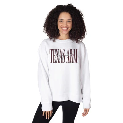 Chicka-D white crewneck sweatshirt featuring oversized maroon Texas A&M lettering with contrasting black script layered across the chest, plus long sleeves, ribbed cuffs, and a relaxed fit.