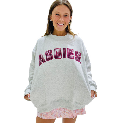 Scarlet & Gold Texas A&M Aggies oversized grey crewneck sweatshirt featuring bold gingham Aggies lettering across the chest