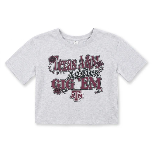 Youth heather gray Texas A&M crop tee featuring retro maroon and black Texas A&M Aggies Gig ’Em lettering, floral accents, A&M logo, crew neckline, short sleeves, and cropped silhouette.