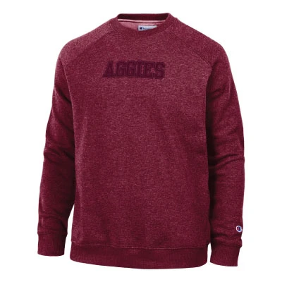 Champion heathered maroon Texas A&M crewneck sweatshirt featuring tonal Aggies lettering across the chest, long raglan sleeves, ribbed cuffs and hem, and a classic relaxed silhouette.