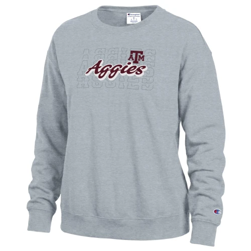 Heather grey Champion Texas A&M crewneck sweatshirt featuring maroon Aggies script, an A&M logo, subtle repeated Aggies lettering in the background, long sleeves, ribbed trim, and Champion cuff logo.