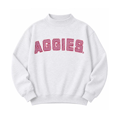Light grey Scarlet & Gold youth Texas A&M mockneck sweatshirt featuring bold Aggies lettering across the chest filled with a maroon and white gingham pattern and finished with ribbed trim.