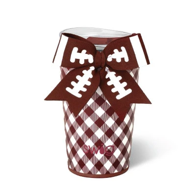 Swig 24 oz Party Cup featuring a maroon and white gingham pattern, dimensional maroon bow with white football lace details, coordinating trim, and Swig logo near the base.
