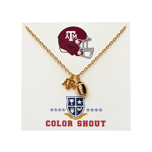 Color Shout Texas A&M gold-tone necklace featuring a delicate oval-link chain with two dangling charms, a gold A&M logo and a miniature football with white detailing, displayed on a branded jewelry card.