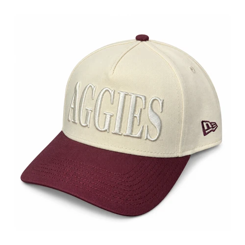 New Era Texas A&M Aggies snapback hat featuring a cream crown, raised tonal AGGIES embroidery, maroon curved bill, embroidered Texas A&M side logo, maroon New Era flag, and adjustable snapback closure.