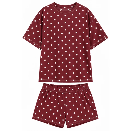 Maroon two-piece matching set featuring a short sleeve crewneck top and coordinating pull-on shorts, both finished with an allover white polka dot pattern and relaxed fit.
