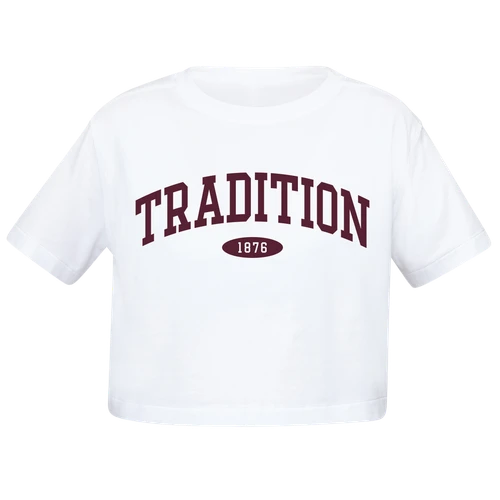 White lululemon Texas A&M cropped short-sleeve tee featuring bold maroon arched Tradition lettering across the chest with 1876 displayed underneath inside a maroon oval and a relaxed collegiate silhouette.