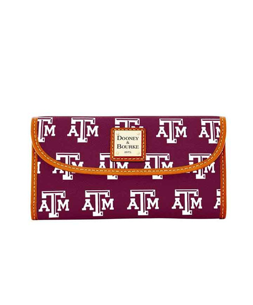 Dooney & Bourke Texas A&M Aggies wristlet wallet featuring maroon ATM logo pattern, brown trim, snap closure, and compact clutch silhouette.
