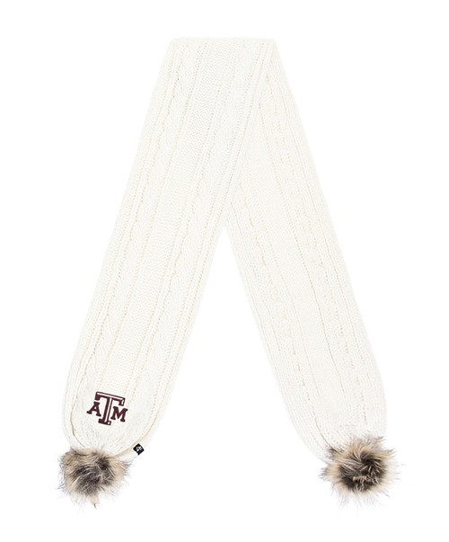 ’47 Brand Texas A&M knit scarf in cream featuring a cable knit design, faux fur pom accents on each end, and embroidered Texas A&M logo patch.