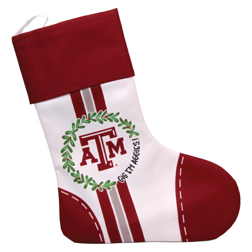 Magnolia Lane Texas A&M Christmas stocking in maroon and white featuring a wreath design with an ATM logo and festive detailing, styled as a spirited Aggies holiday mantle decoration.