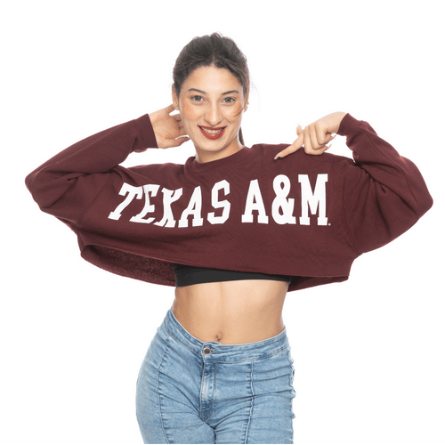 Maroon ZooZatz Texas A&M cropped sweatshirt featuring bold white “Texas A&M” lettering across the front, styled as a trendy women’s game day pullover for Aggies fans.