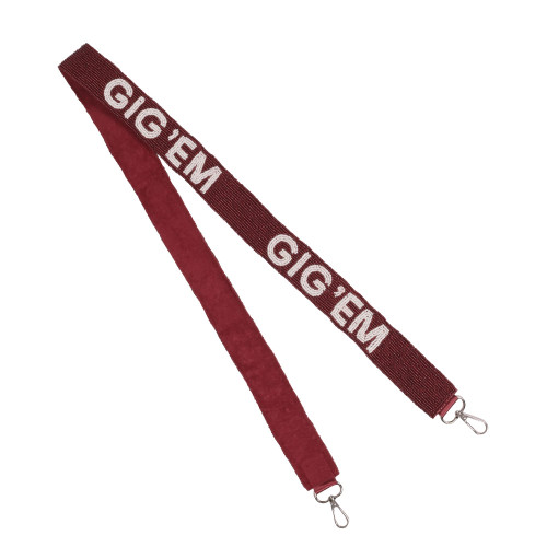 Maroon Capri Designs interchangeable purse strap featuring bold white “Gig Em” lettering and silver hardware clips, styled as a Texas A&M Aggies game day handbag accessory.