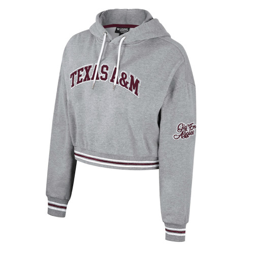 Gray Colosseum Texas A&M cropped hoodie featuring arched Texas A&M lettering across the chest and script detail on the sleeve, styled as a trendy Aggies game day sweatshirt for women.