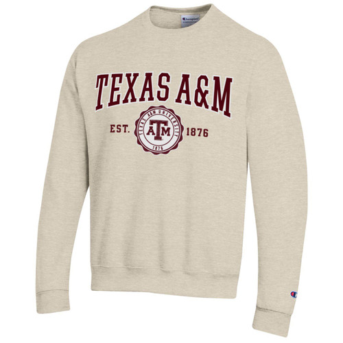 Cream Champion Texas A&M crewneck sweatshirt featuring Texas A&M lettering with an est 1876 emblem and ATM logo on the chest, styled as a classic Aggies heritage game day pullover.