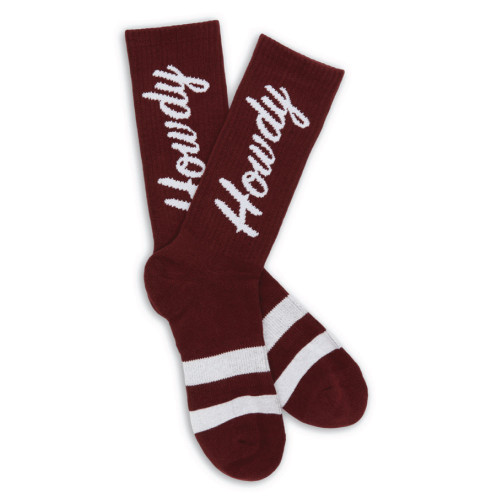Maroon Dead Soxy Texas A&M crew socks featuring bold white “Howdy” script and white stripe detailing near the toe, styled as a spirited Aggies game day accessory.