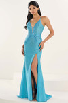 Tiffany Designs 16320 in Turquoise — front angle featuring shimmer jersey drape and body-contouring beaded lines.