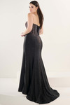 Tiffany Designs 16282 in Black — side/back angle showing fitted silhouette, shimmer jersey drape, and sweep train.