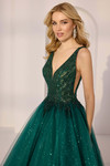 Close-up of intricate beaded bodice with illusion side panels on Morilee 49290 in emerald.