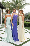 Portia and Scarlett PS26032 satin gowns in mint, periwinkle, and cream colors outdoors, showcasing the timeless fit-and-flare silhouette and elegant design.