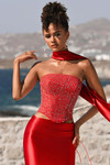 PS26042 close-up in red of beaded corset bodice and structured boning, detail shot.
