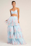 Model wearing Portia and Scarlett PS26272 blue two-piece floral embroidered prom dress with tiered tulle skirt.