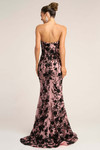 Back view of the PS26302E evening gown in black and pink, showing the sculpted fit, strapless neckline, and floral detailing.