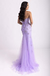 Lilac gown shown from the back, focusing on the lace-up design and flowing train.