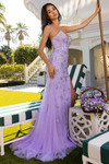 Lilac beaded strapless gown photographed outdoors, highlighting the shimmering train.