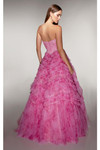 Back view of the bubblegum pink ball gown showing the structured mid-open back and full ruffled tulle skirt.