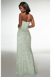 Back view of green beaded dress showing scoop back and sequin coverage