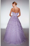 Back view of lilac glitter tulle ball gown with lace-up back and tiered ruffle skirt.