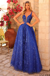 Model wearing a royal blue embroidered A-line prom dress with plunging sweetheart neckline and floral lace.