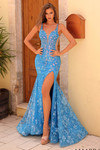 Model wearing a turquoise fit-and-flare sequin lace prom dress with deep V illusion neckline and thigh-high slit.