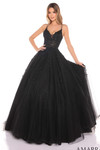Model wearing the black A-line prom dress with lace corset bodice and glitter skirt.