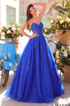 Royal blue glitter tulle ball gown with sweetheart neckline, lace applique corset bodice, and full skirt.
