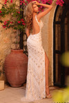 Amarra 89071 ivory gold beaded prom gown showcasing open low back design and intricate sequin detailing