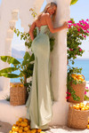 Amarra 89078 sage green beaded jersey gown showing adjustable lace-up back and elegant sweep train, back view