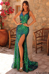 Model wearing an emerald sequin fitted prom dress with a sweetheart neckline and thigh-high slit.