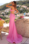 Bright pink fitted jersey prom dress with open low back, double straps, side cut-outs, and a sleek floor-length skirt with thigh-high slit.